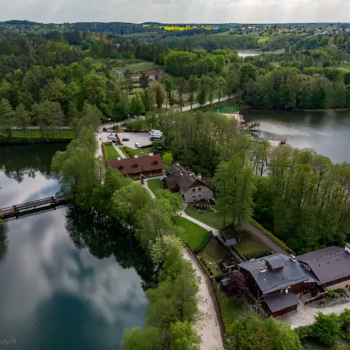 Hotel complex amidst water and forest